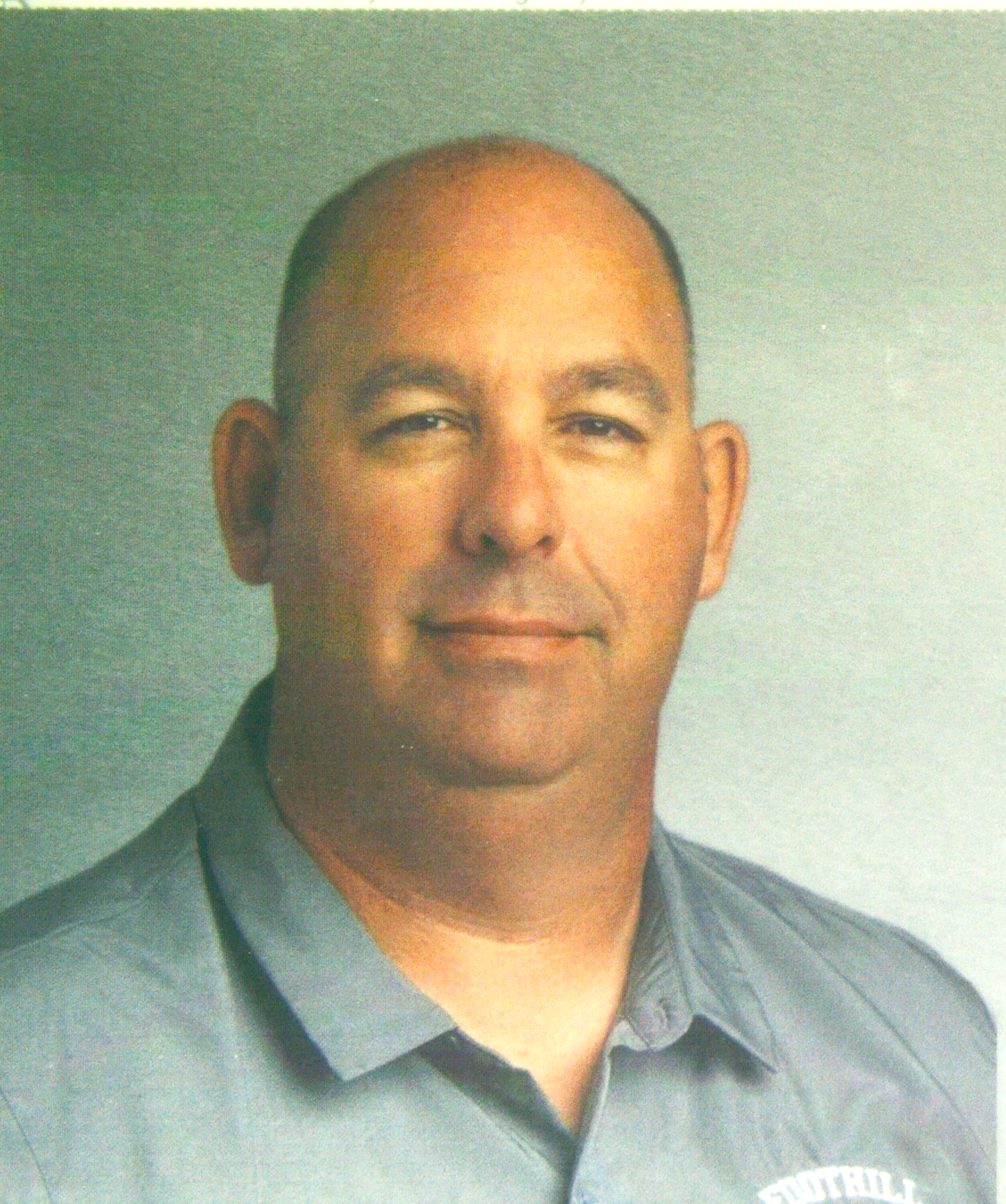 man posing for school pic