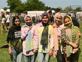 5 female students posing for a photo after the run.