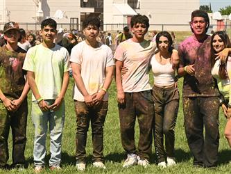 7 students posing for a photo after the run.